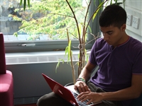 A student working on a laptop